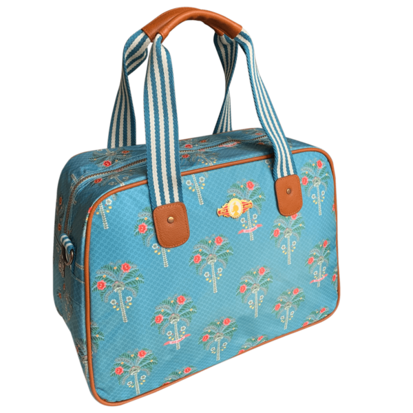 Niebieska torba z eleganckimi motywami palm z syntetycznego materiału ze skórzanymi wstawkami.