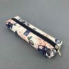 Etui saszetka piórnik jamnik niebieskie róże 5903641209847